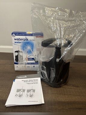 Waterpik Water Flosser Ultra WP-112W - Black OPEN BOX CONTENTS STILL SEALED